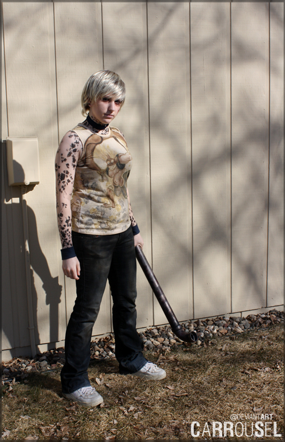 Photo of carrousel cosplaying Heather Mason (Silent Hill 3) .